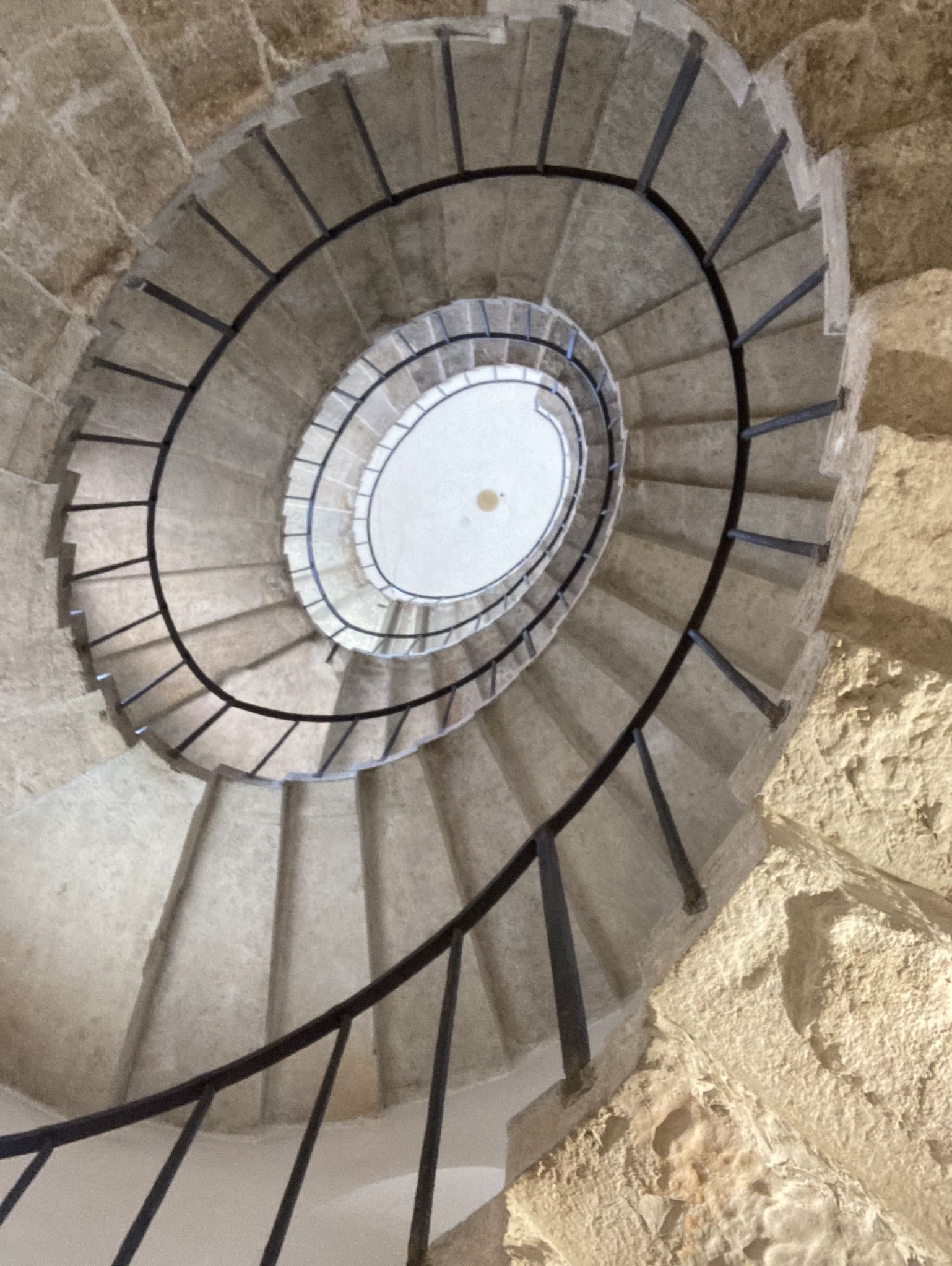 spiral white brick staircase from above