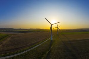 A wind turbine on an open field